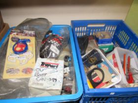 Two boxes of mixed includng filters, spark plugs and bulbs etc.