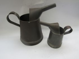 Two oil jugs with lead stamps