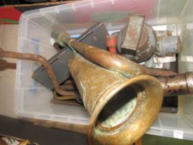 A box of tools etc. including a brass horn and a Daimler grease gun