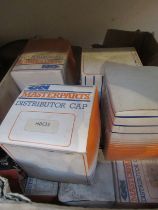 A quantity of new old stock, distributor caps