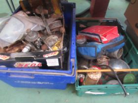 Two boxes of mixed spares including lead lamps, chromed ashtrays, chrome over-riders, handles,