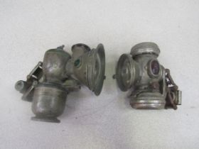 Two carbide bicycle lamps, labelled Lucas and Zephyr