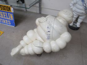 A moulded Michelin Man on bracket a/f