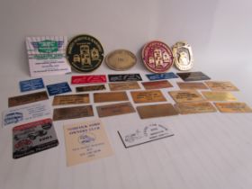 A quantity of brass and other car show and rally plaques from the 1990's