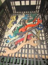 A box of vintage tractor spanners