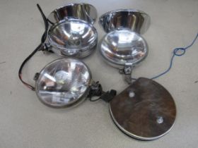 Two chromed Lumax lamps, two chromed shields, a chromed Butlers lamp and a chromed Webber fitter