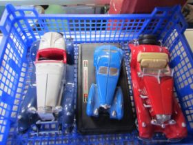 Three Burago model cars including Mercedes Benz