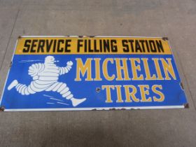 A reproduction Michelin Tires "Service Filling Station" enamel sign, 48cm x 23cm