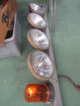 A set of four Boreman spotlights and two amber recovery lights mounted on brackets