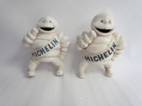 A pair of cast reproduction Michelin Men