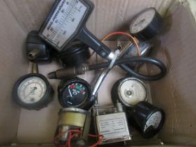 a box of gauges and meters