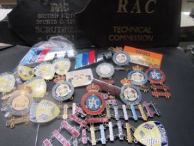 A quantity of mixed motoring related pin badges along with two RAC sports council armbands and two