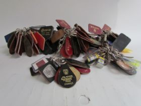 A large quantity of mixed vehicle related key rings