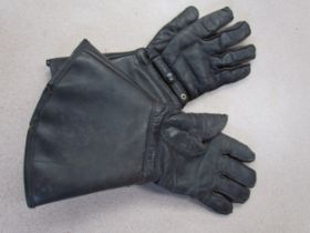 A pair of leather gauntlets