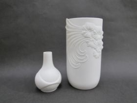 A West German Kaiser porcelain white matte vase by Martin Frey with relief moulded floral design,