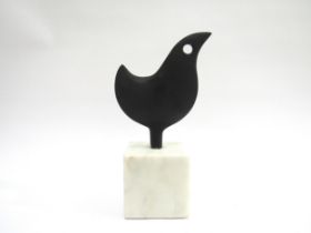 A stylised metal bird sculpture on white stone base, unmarked. 22cm high