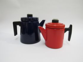 Finel 1960's Finnish enamel coffee pots, one red, 16cm high, one dark blue, 19cm high, designed by