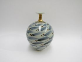 DEREK CLARKSON (1938-2013) A finely thrown porcelain vase with glazed and gilt decoration. Impressed