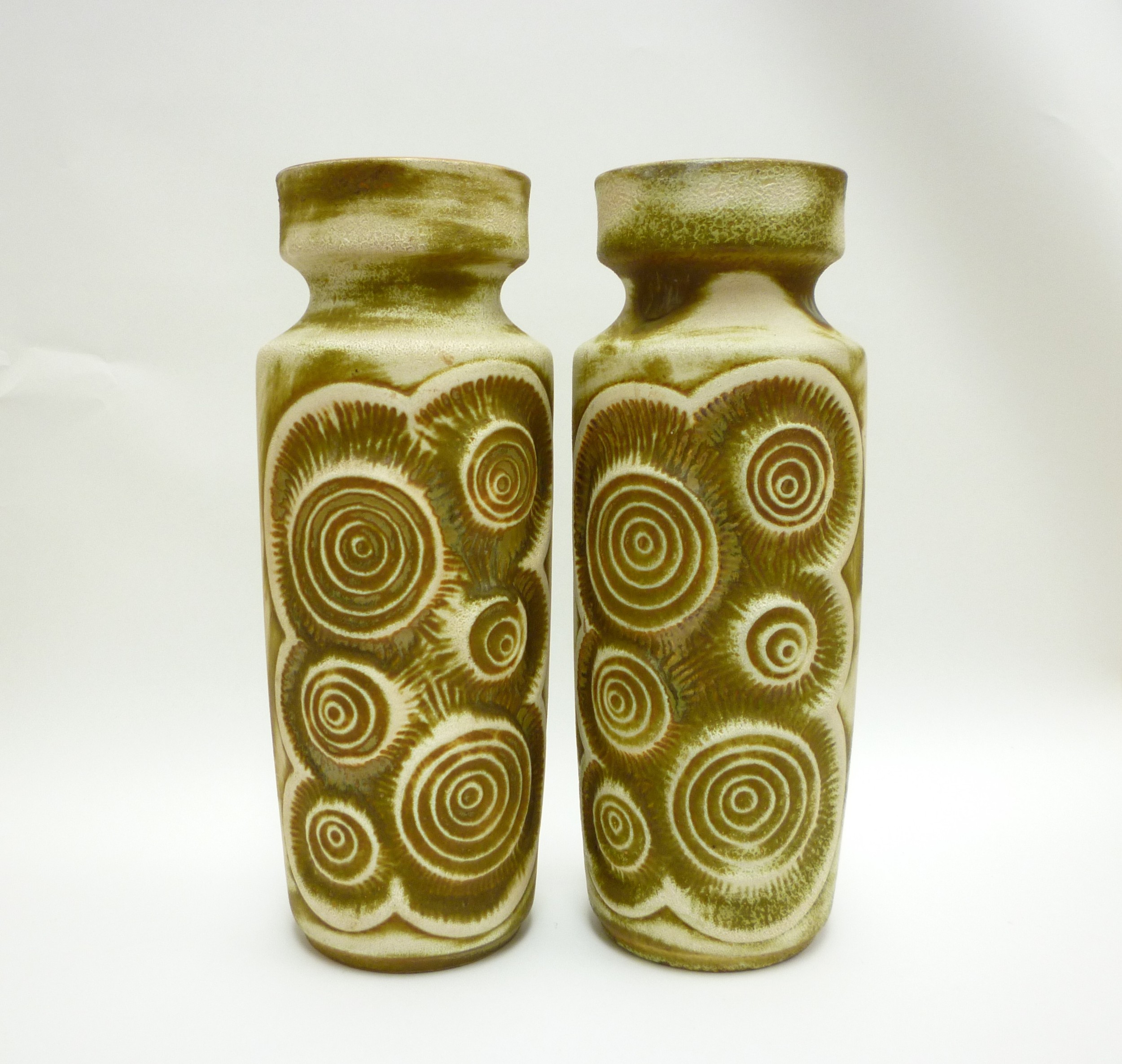 A Pair of Bay Keramik West German floor vases with relief moulded fossil design, caramel glazes,