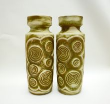A Pair of Bay Keramik West German floor vases with relief moulded fossil design, caramel glazes,