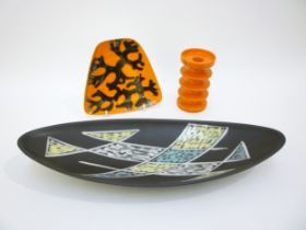 Three Post War ceramic items to include Poole Delphis '81' dish, Carlton ware three ring candle