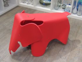 Charles and Ray Eames red elephant stool by Vitra. 72cm long x 40cm wide x 42cm high. (Button