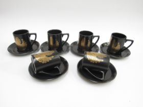 Portmeirion Pottery - A set of six coffee cups and saucers in the gold Phoenix pattern by John