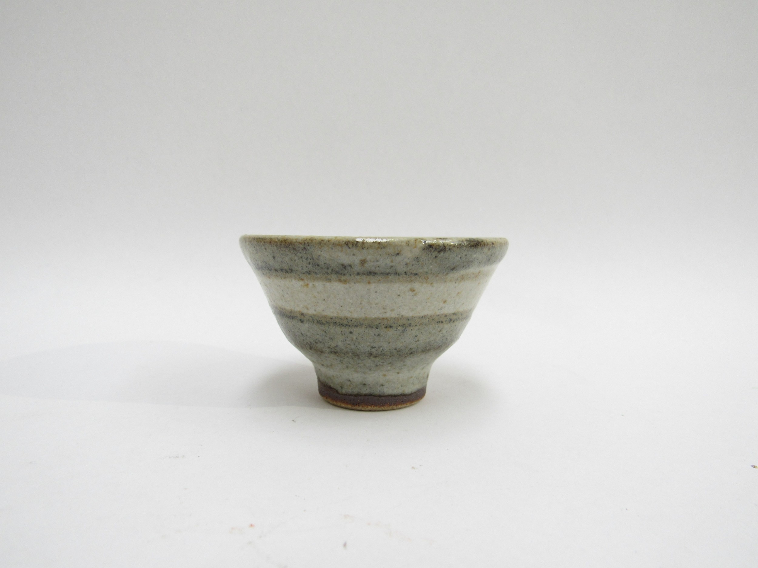 A Japanese studio pottery Mashiko miniature bowl with painted line details, possibly Narui Fujio, - Image 2 of 3