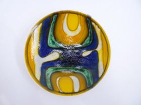 A Poole Delphis circa 1964-7 plate in yellow and blue and green colours. Blue back stamp, 20cm