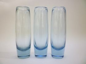 Three Per Lutken Holmegaard cylindrical vases in pale blue, No.220210. Incised marks to bases.