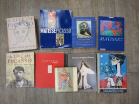 A collection of art books relating to the artists Pablo Picasso and Henri Matisse