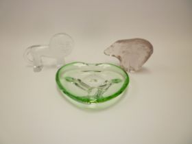 A Kosta Glass heart form dish in green glass, signed to base, a Pukeberg figure of a Polar Bear