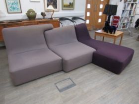 A Ligne Roset 'Confluences' three-section modular corner sofa suite in mauve and purple. With Fire