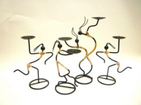 Three Danish modernist candleholders by Laurids Lonborg and one other. Tallest 32.5cm