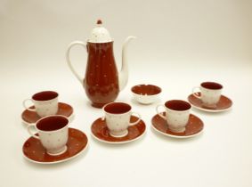 A late 20th Century Susie Cooper designed part coffee set to include five cups and saucers, sugar