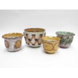 Four Italian Pottery plant pots, various designs. (chip to rim of smallest). Tallest 14cm