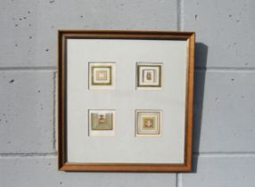 A mid to late 20th Century framed and glazed group of four coloured geometric & line images framed