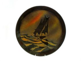 A Poole Pottery Aegean Charger depicting a sailing ship. 41.5cm diameter