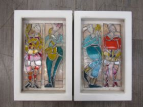Two framed stained glass decorative wall boxes with backlit facility, featuring to stylised figures,