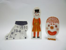 Three Carlton Ware money boxes, Beefeater, Clown and 'Lived in a Shoe'. Tallest 22cm