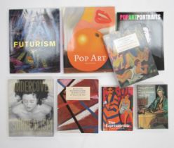 A collection of eight art reference books including artistic styles - Surrealism, Futurism, Pop