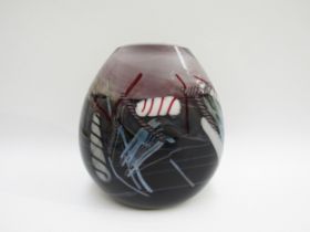 DANIEL EDLER : An American studio art glass vase with assorted cane inclusions. Etched marks to base
