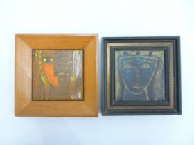 MARIA GEURTEN (1929-1998): Two framed ceramic tiles, stylised heads. Details verso. Tile size 15.3cm