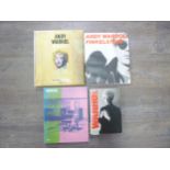 Four various volumes relating to Andy Warhol.