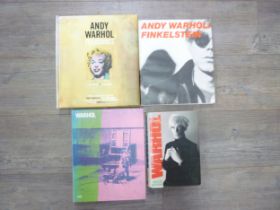 Four various volumes relating to Andy Warhol.