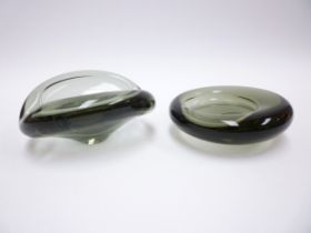 Two Holmegaard Per Lutken designed smoked glass dishes, etched marks to bases. Tallest 6.5cm