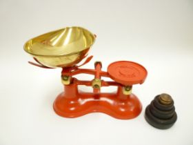 'Victor England' red painted kitchen scales designed by Robert Welch, together with an associated