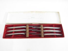 A boxed set of six steak knives by Gerber Miming