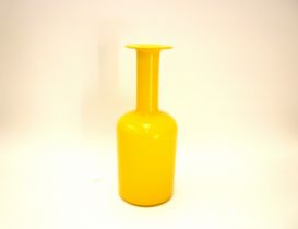 A Holmegaard 'Gul' vase in yellow glass designed by Otto Brauer. 30.5cm high