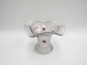A 1980's art glass iridescent vase with amethyst trailing overlay. Etched V.P. '84 to base, 15cm